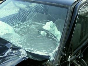 A broken windshield on a carcar accident