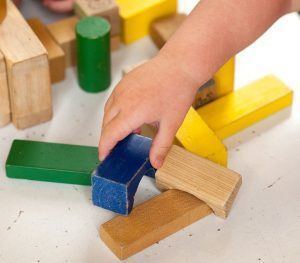 child playing with blocks