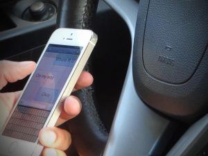 Person texting while driving