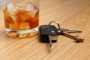 Keys Next to a Glass of Whiskey